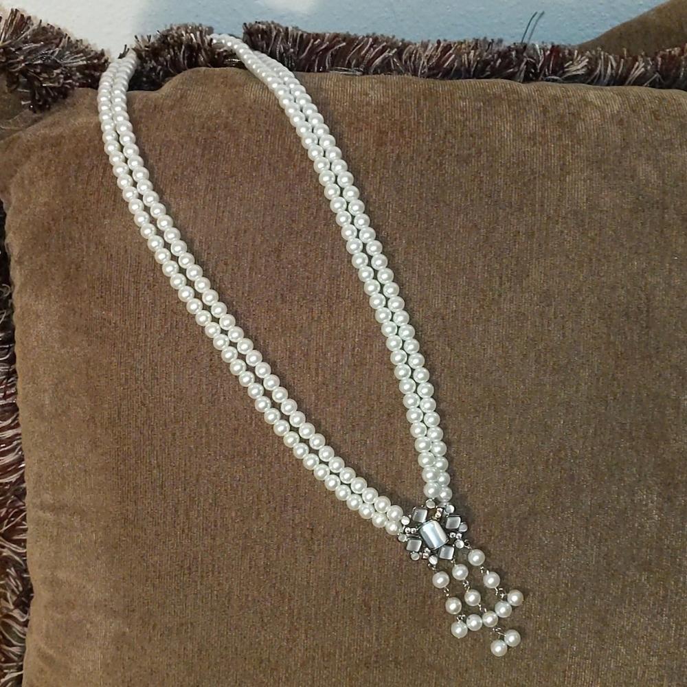 *. Necklace